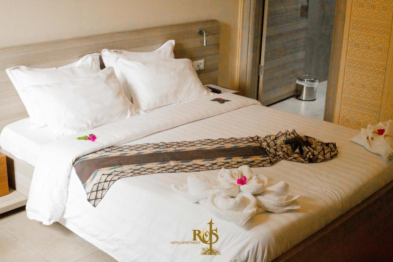 Roots Hotel Apartments Abidjan Bagian luar foto