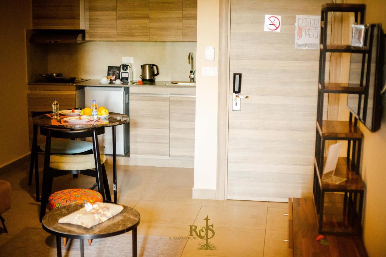 Roots Hotel Apartments Abidjan Bagian luar foto