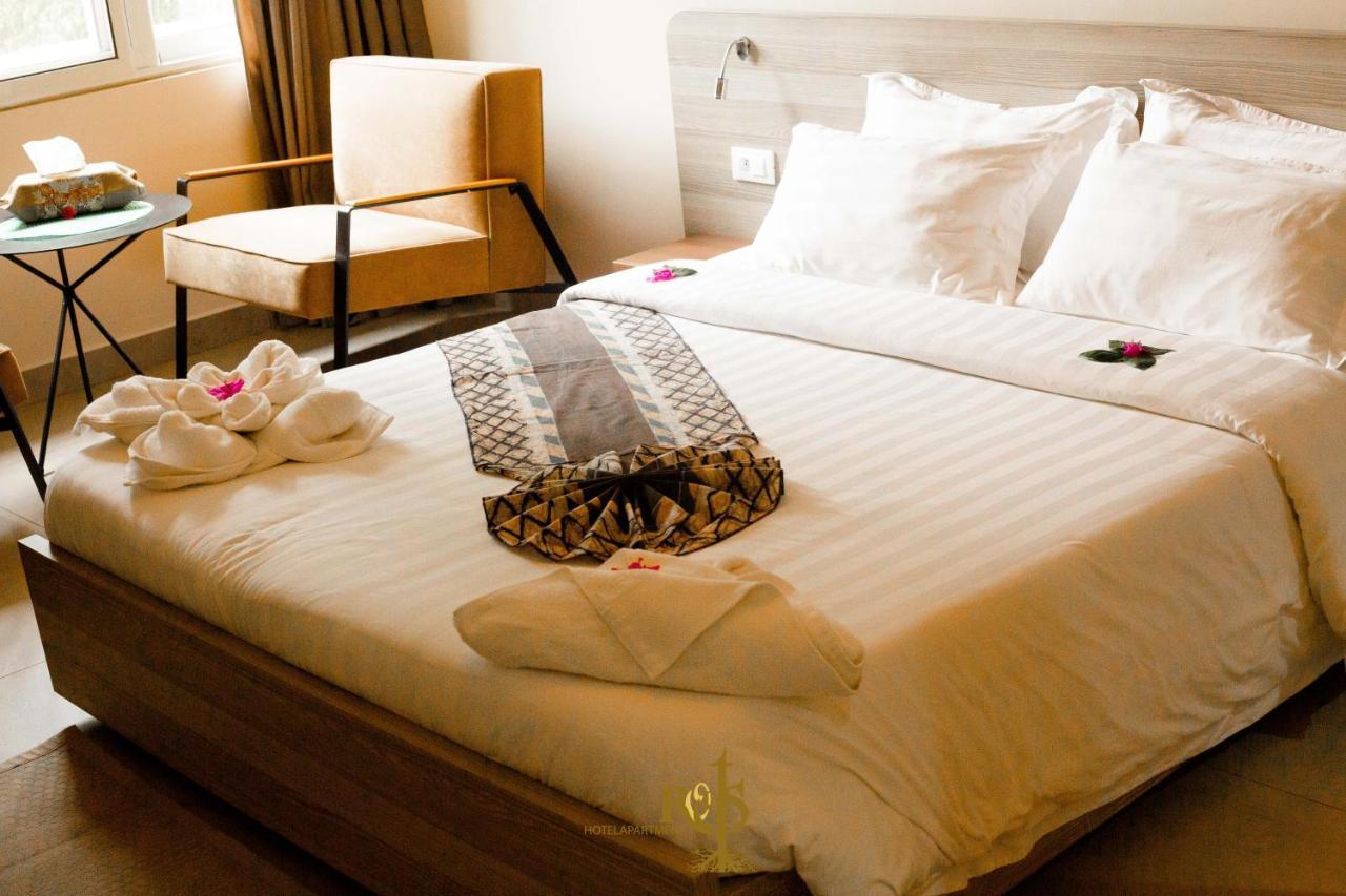 Roots Hotel Apartments Abidjan Bagian luar foto