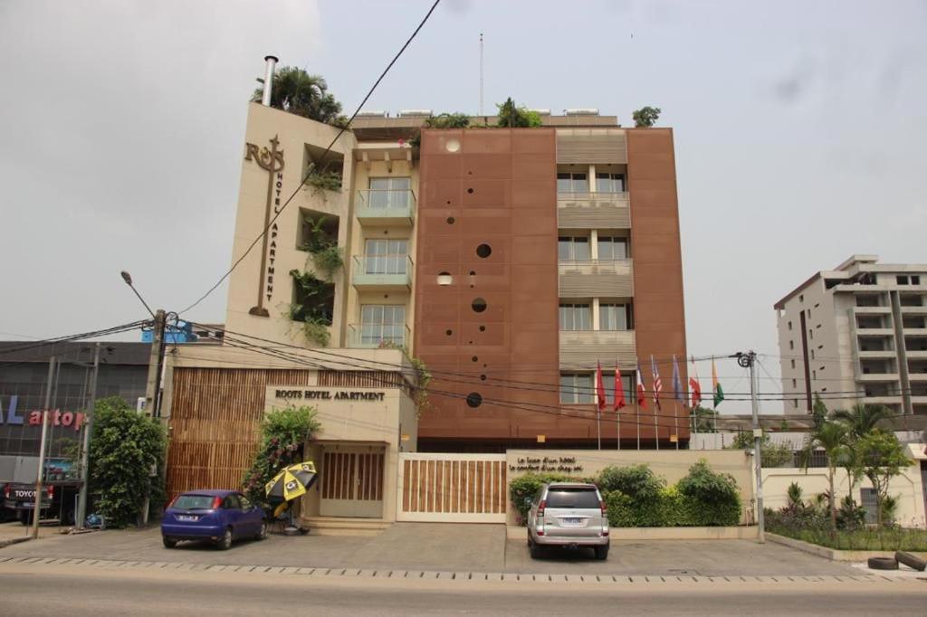Roots Hotel Apartments Abidjan Bagian luar foto