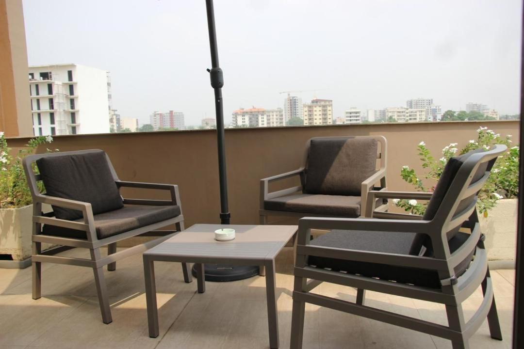 Roots Hotel Apartments Abidjan Bagian luar foto