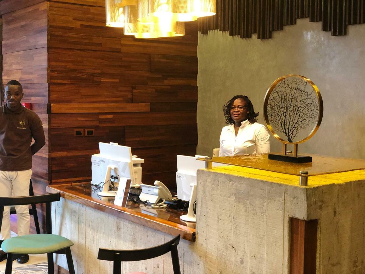 Roots Hotel Apartments Abidjan Bagian luar foto