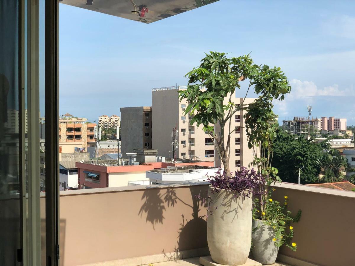 Roots Hotel Apartments Abidjan Bagian luar foto