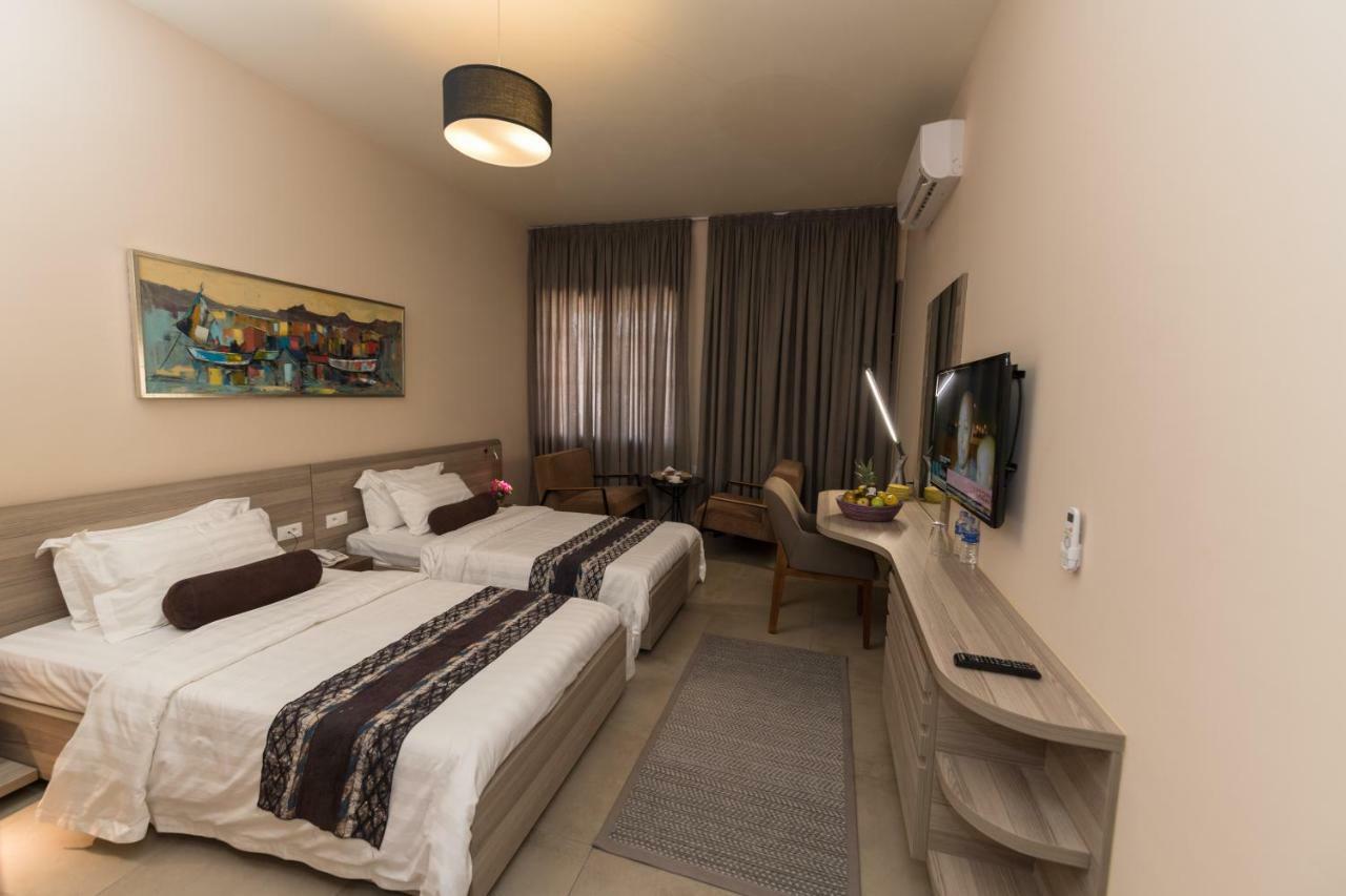 Roots Hotel Apartments Abidjan Bagian luar foto