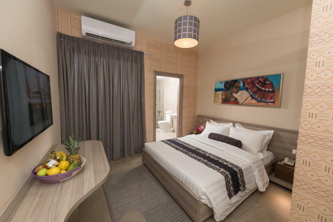 Roots Hotel Apartments Abidjan Bagian luar foto