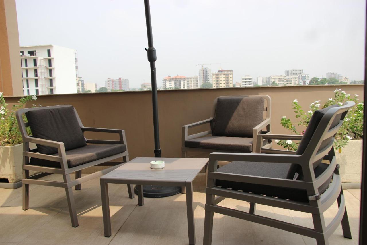 Roots Hotel Apartments Abidjan Bagian luar foto